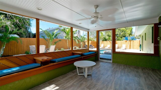 1010 68th St NW, Bradenton, FL 34209 - sunroom / solarium featuring a ceiling fan and wood finished floors