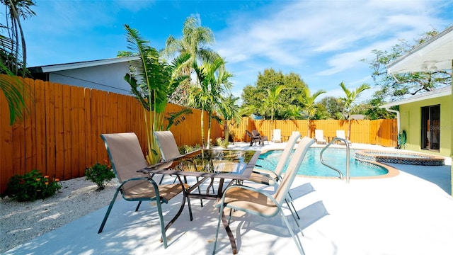 1010 68th St NW, Bradenton, FL 34209 - view of pool with a fenced backyard, a patio, and a pool with connected hot tub