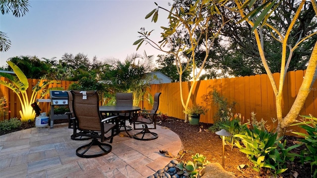 1010 68th St NW, Bradenton, FL 34209 - view of patio featuring outdoor dining space and a fenced backyard