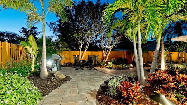 1010 68th St NW, Bradenton, FL 34209 - view of patio / terrace featuring a fenced backyard and outdoor dining space