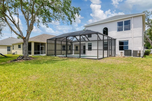 back of property with cooling unit, a lawn, a lanai, and an outdoor pool
