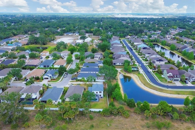 view of property location featuring nearby suburban area and a nearby body of water