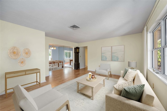 living room with wood finished floors and baseboards