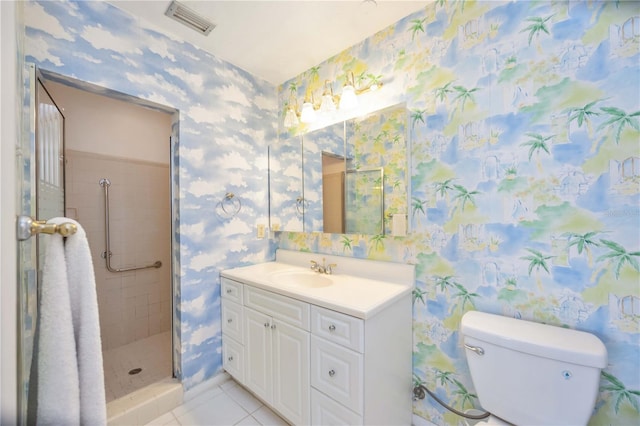 full bath featuring toilet, wallpapered walls, visible vents, a shower stall, and vanity