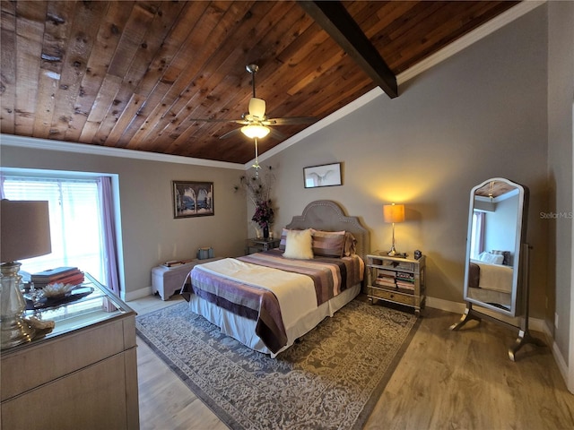 bedroom featuring wood ceiling, crown molding, vaulted ceiling, light wood-type flooring, and baseboards