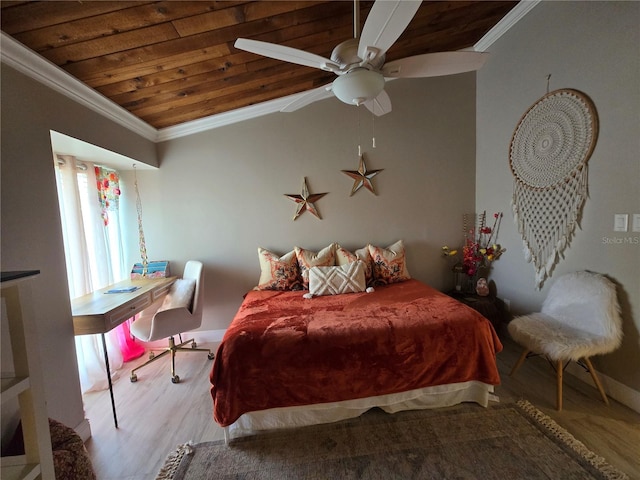 bedroom with wood ceiling, wood finished floors, ornamental molding, vaulted ceiling, and baseboards