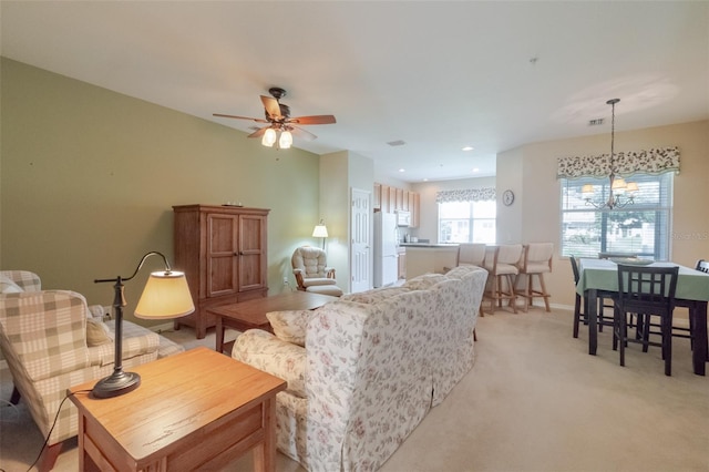 4103 Foristall Ave Unit 4103, Sarasota, FL 34233 - living area with a chandelier, ceiling fan, light carpet, baseboards, and recessed lighting