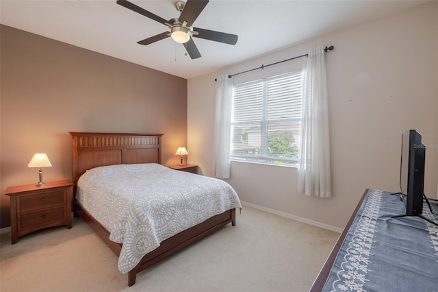4103 Foristall Ave Unit 4103, Sarasota, FL 34233 - bedroom featuring light carpet, baseboards, and ceiling fan