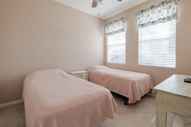 4103 Foristall Ave Unit 4103, Sarasota, FL 34233 - bedroom with light colored carpet, ceiling fan, and baseboards