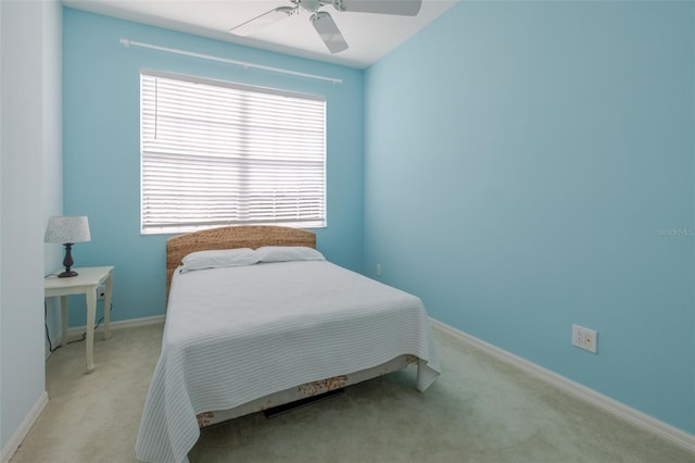 4103 Foristall Ave Unit 4103, Sarasota, FL 34233 - bedroom featuring carpet flooring, baseboards, and a ceiling fan