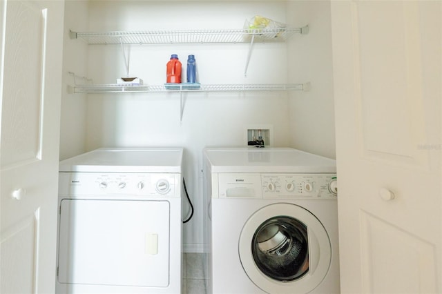 4103 Foristall Ave Unit 4103, Sarasota, FL 34233 - laundry area featuring independent washer and dryer