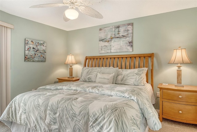 carpeted bedroom with a ceiling fan