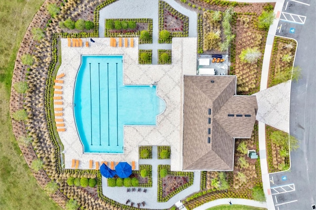 drone / aerial view of a pool