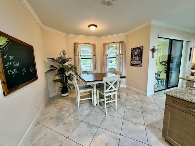 1568 Cordgrass Way, Lakeland, FL 33813 - dining area with ornamental molding and light tile patterned floors