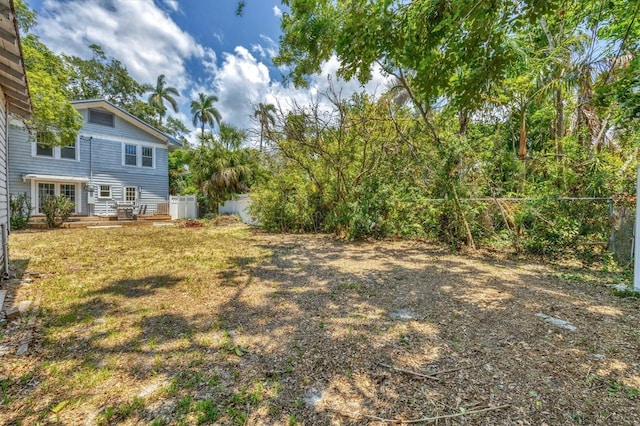 view of yard with fence