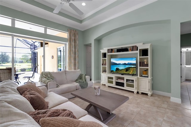 1542 Ormond Ter, Parrish, FL 34219 - living room featuring plenty of natural light, ceiling fan, ornamental molding, baseboards, and a sunroom