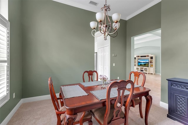 1542 Ormond Ter, Parrish, FL 34219 - carpeted dining room featuring crown molding, a chandelier, baseboards, and healthy amount of natural light