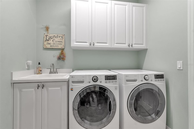 1542 Ormond Ter, Parrish, FL 34219 - laundry area with cabinet space and washer and clothes dryer