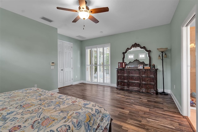 1542 Ormond Ter, Parrish, FL 34219 - bedroom with wood finished floors, baseboards, ceiling fan, and a closet