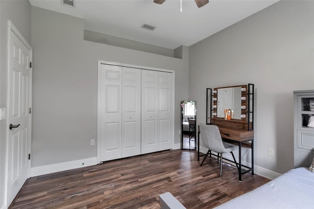 1542 Ormond Ter, Parrish, FL 34219 - bedroom featuring dark wood-type flooring, a closet, baseboards, and ceiling fan