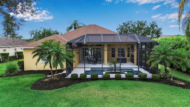 1542 Ormond Ter, Parrish, FL 34219 - rear view of house featuring a patio, stucco siding, a lawn, and an outdoor pool