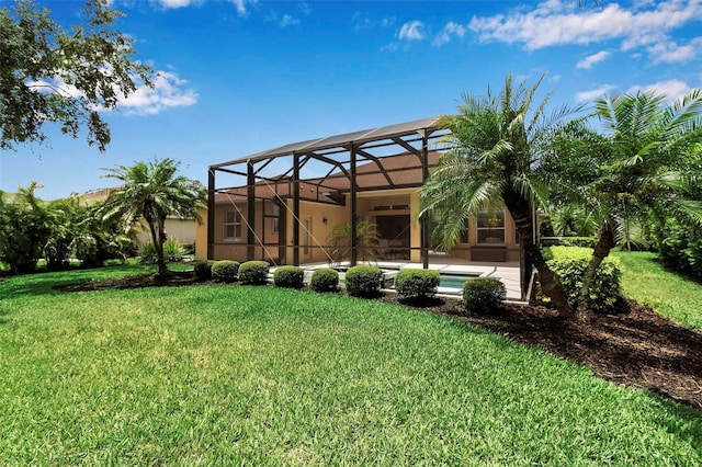 1542 Ormond Ter, Parrish, FL 34219 - view of grassy yard featuring glass enclosure, an outdoor pool, and a patio area