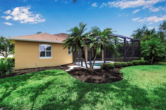 1542 Ormond Ter, Parrish, FL 34219 - view of grassy yard with an outdoor pool and a lanai