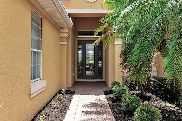 1542 Ormond Ter, Parrish, FL 34219 - doorway to property featuring stucco siding