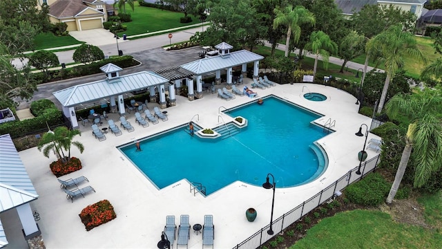 1542 Ormond Ter, Parrish, FL 34219 - community pool with a gazebo, fence, and a patio area