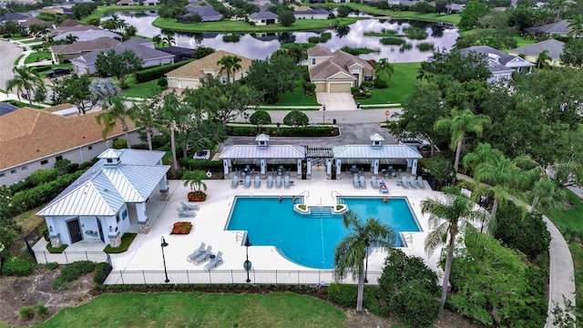 1542 Ormond Ter, Parrish, FL 34219 - aerial perspective of suburban area with a nearby body of water and a pool