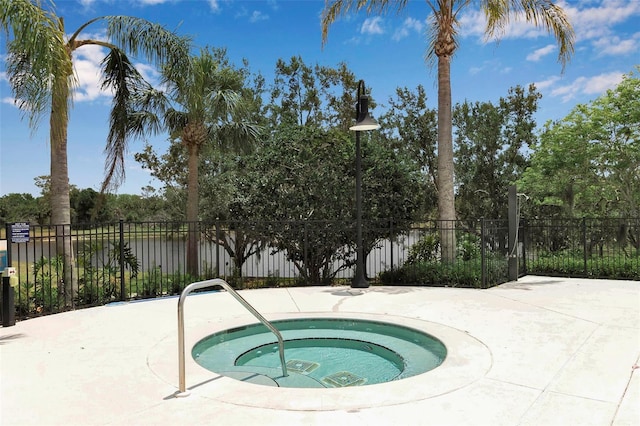 1542 Ormond Ter, Parrish, FL 34219 - view of swimming pool with a hot tub and fence