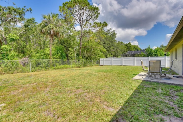 view of yard with a patio area