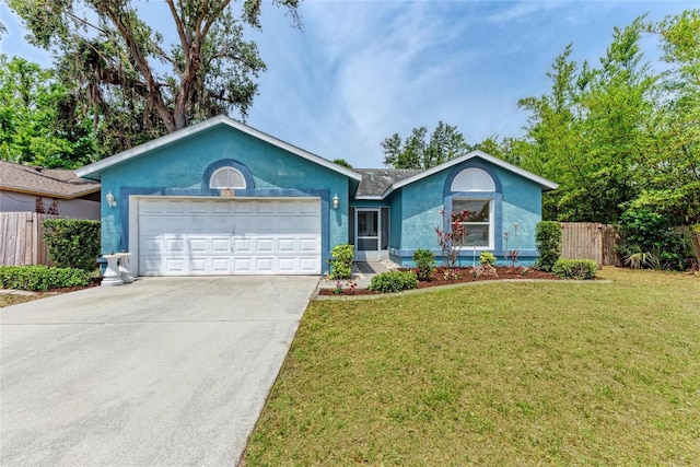 ranch-style house with a garage, driveway, and stucco siding