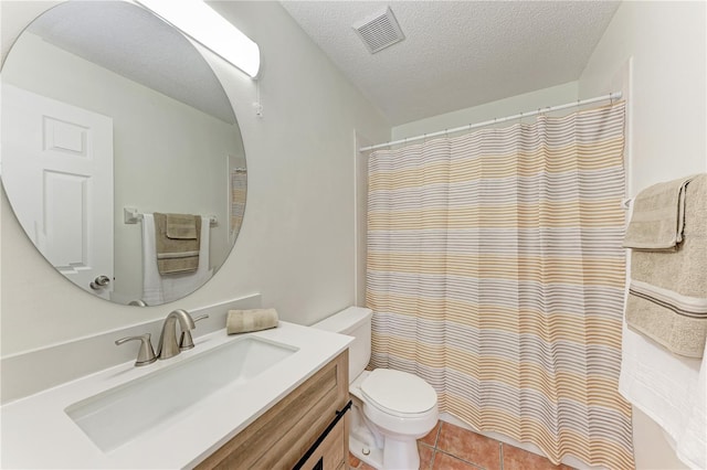 full bathroom with toilet, a textured ceiling, tile patterned flooring, vanity, and a shower with curtain