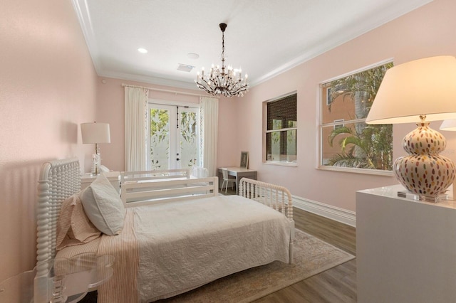 bedroom featuring crown molding, a chandelier, baseboards, wood finished floors, and recessed lighting