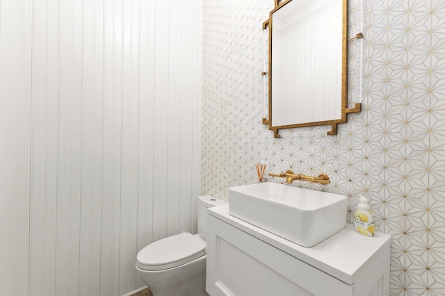 half bath with toilet and vanity