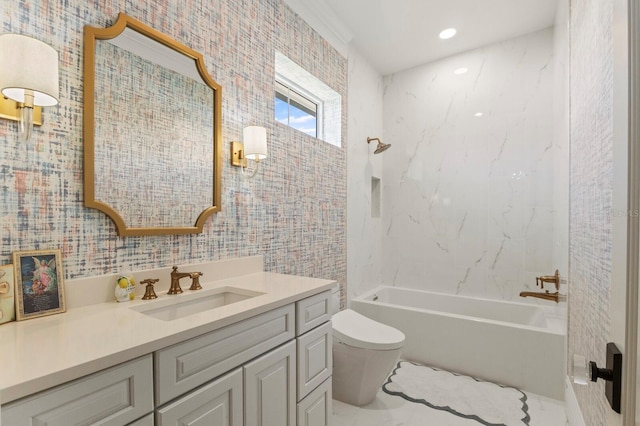 bathroom with toilet, vanity, and tub / shower combination