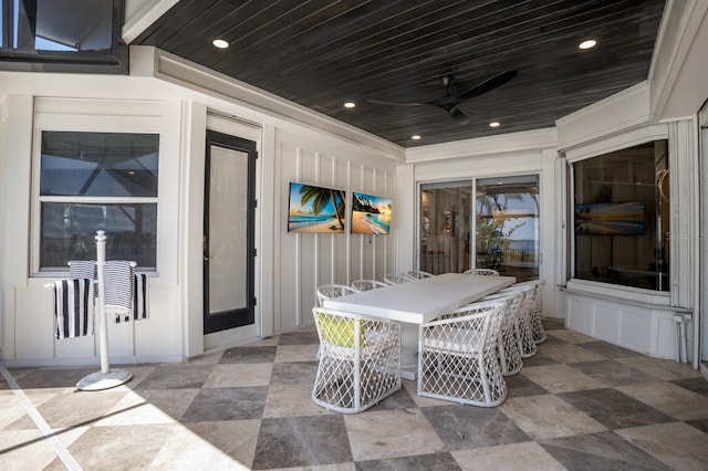 view of patio / terrace with a ceiling fan and outdoor dining space