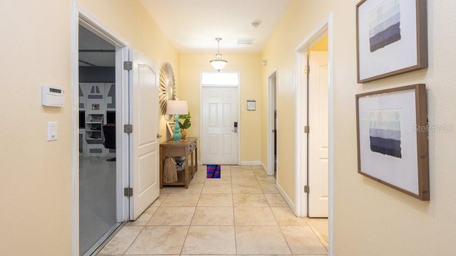 1450 Rolling Fairway Dr, Davenport, FL 33896 - entrance foyer featuring light tile patterned floors