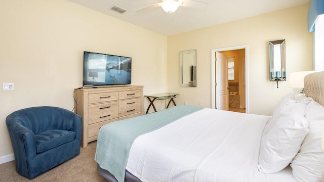 1450 Rolling Fairway Dr, Davenport, FL 33896 - carpeted bedroom featuring ensuite bath, a ceiling fan, and baseboards