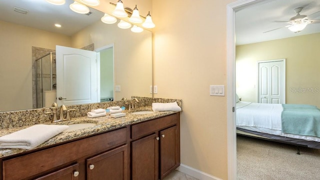 1450 Rolling Fairway Dr, Davenport, FL 33896 - ensuite bathroom with a shower stall, ceiling fan, double vanity, and baseboards