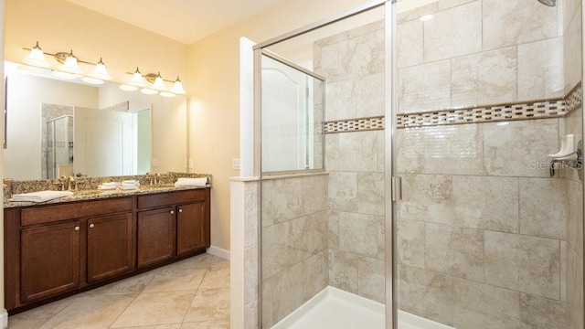1450 Rolling Fairway Dr, Davenport, FL 33896 - full bathroom with a shower stall, double vanity, tile patterned floors, and baseboards