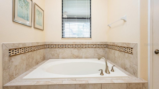 1450 Rolling Fairway Dr, Davenport, FL 33896 - bathroom featuring a garden tub