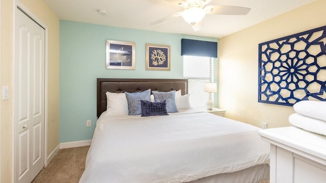 1450 Rolling Fairway Dr, Davenport, FL 33896 - carpeted bedroom featuring a closet, ceiling fan, and baseboards