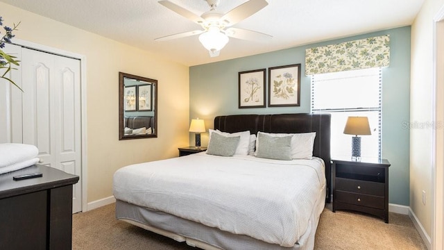 1450 Rolling Fairway Dr, Davenport, FL 33896 - bedroom with light colored carpet, baseboards, ceiling fan, and a closet