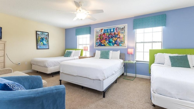 1450 Rolling Fairway Dr, Davenport, FL 33896 - bedroom featuring multiple windows, carpet flooring, and baseboards