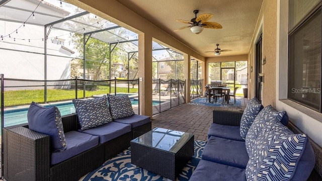 1450 Rolling Fairway Dr, Davenport, FL 33896 - view of patio / terrace with an outdoor hangout area, a lanai, and a ceiling fan