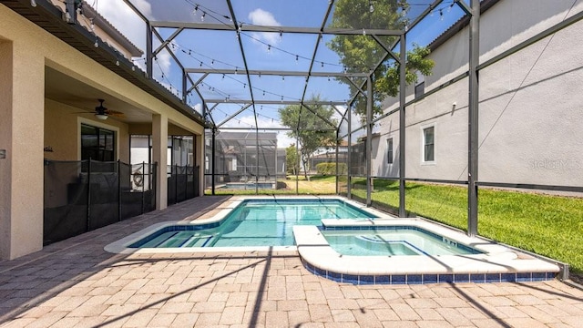 1450 Rolling Fairway Dr, Davenport, FL 33896 - view of pool featuring a patio, a lanai, a pool with connected hot tub, and ceiling fan