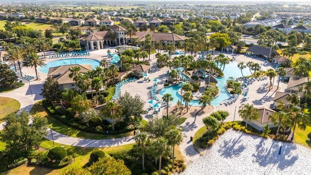 1450 Rolling Fairway Dr, Davenport, FL 33896 - aerial view of property and surrounding area featuring a pool and nearby suburban area