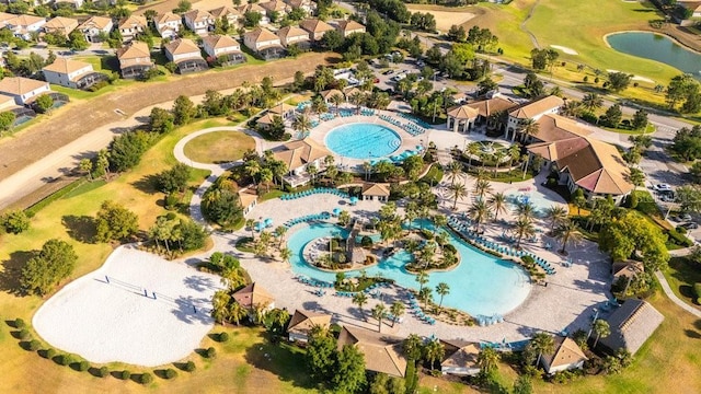 1450 Rolling Fairway Dr, Davenport, FL 33896 - aerial view of residential area with a pool area, a local golf course, and a large body of water